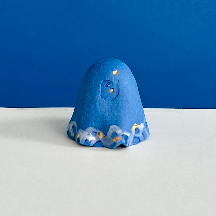 Blue Ghost with Gold Tears dripping into the Lake